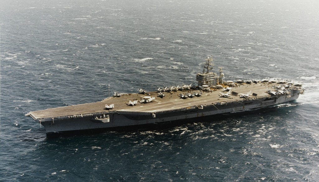USS Nimitz (CVN-68) underway in the Persian Gulf with Carrier Air Wing (CVW) 9, 23 March 1993, enforcing the no-fly zone against Iraq on the first day of Operation Southern Watch. US Navy photo by PH2 Tim Tow. Naval History & Heritage Command (NH&HC), photo # NH 106554-KN.    https://www.history.navy.mil/